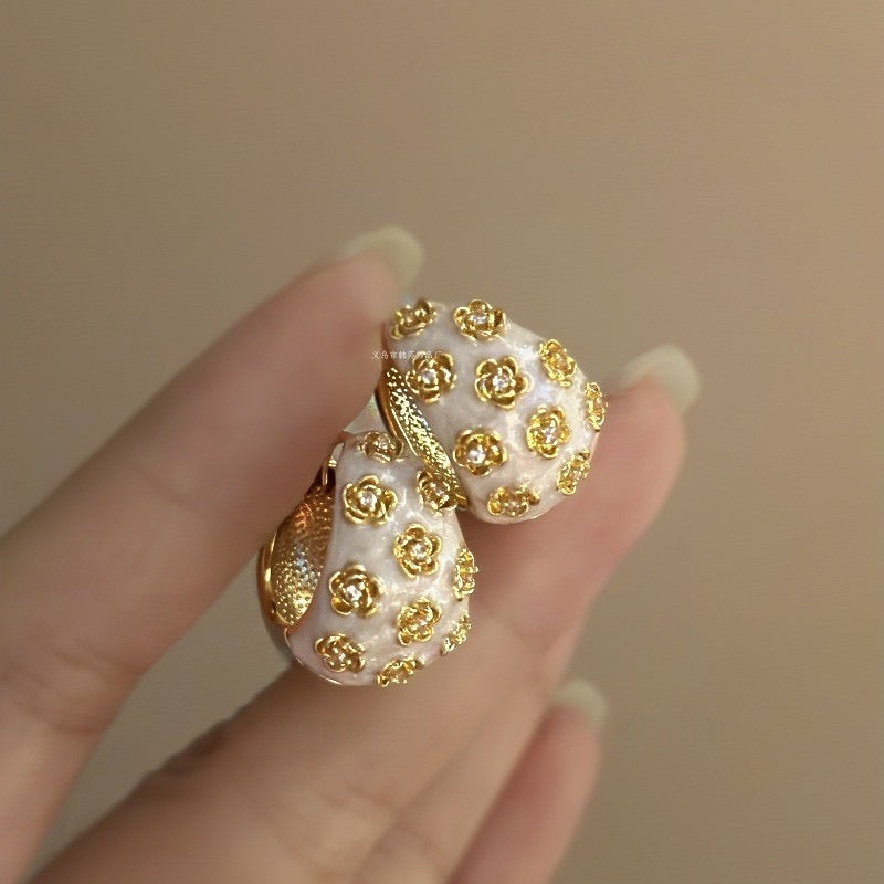 Aretes tipo chalupita con diseño