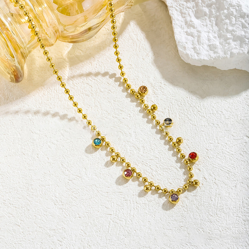 Collar bolitas de colores