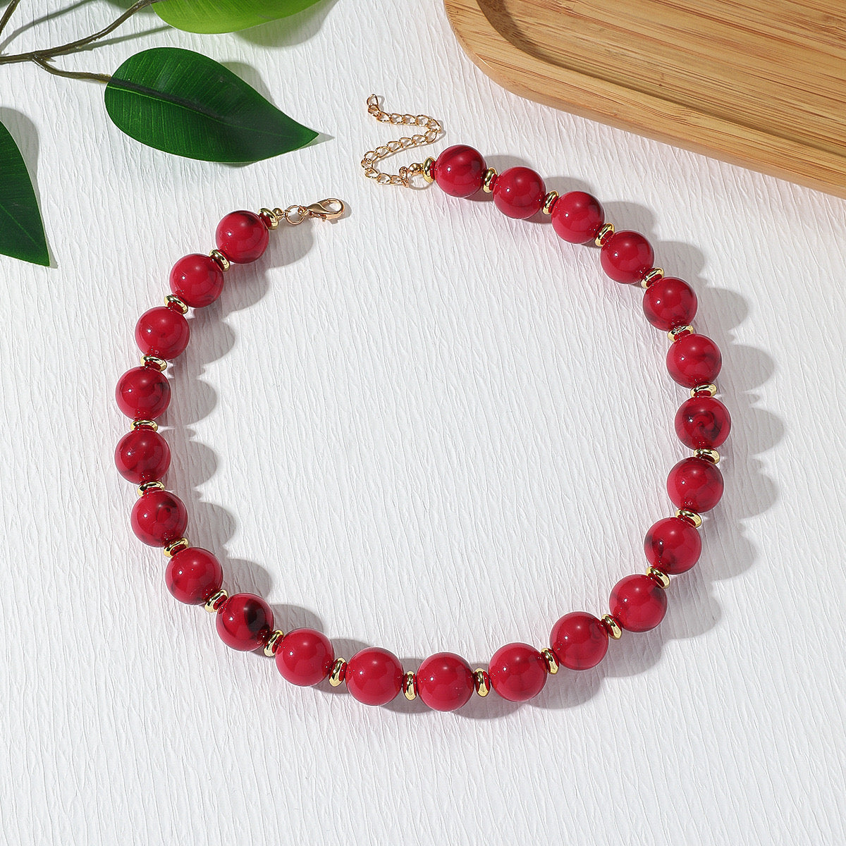 Collar bolas rojas