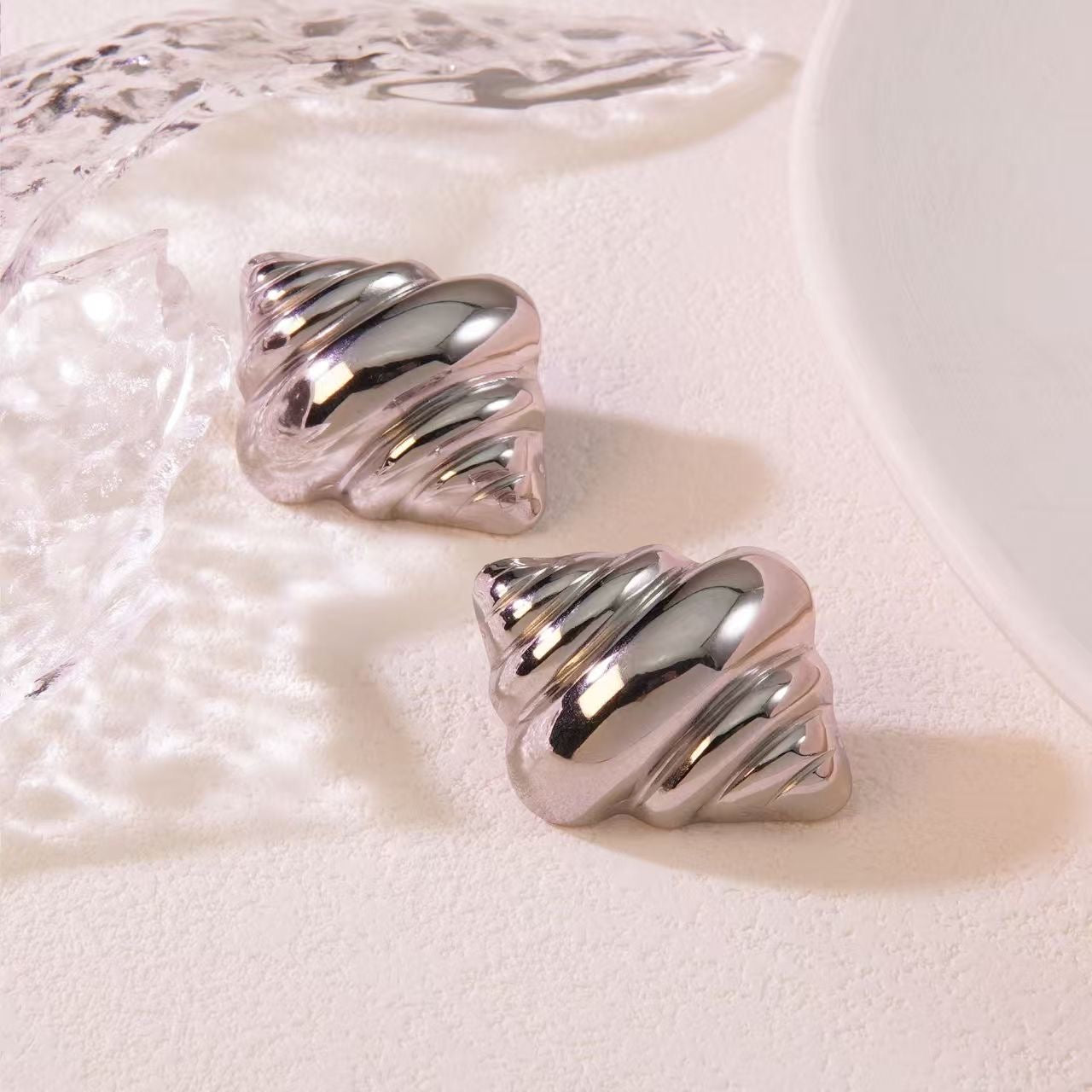 Aretes caracol plata