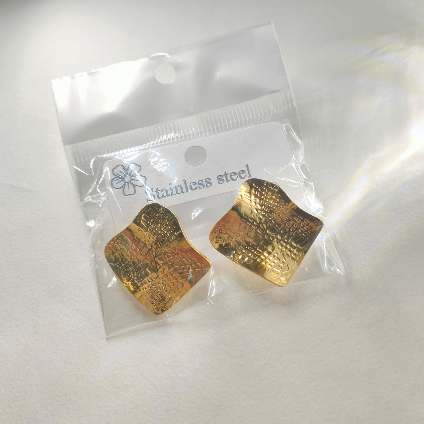 Aretes cuadro con ondas