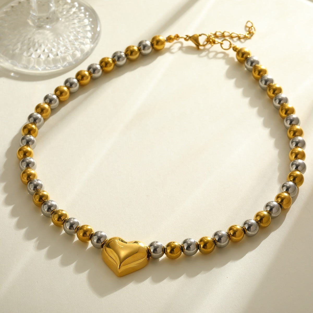 Collar de balín corazón bitono
