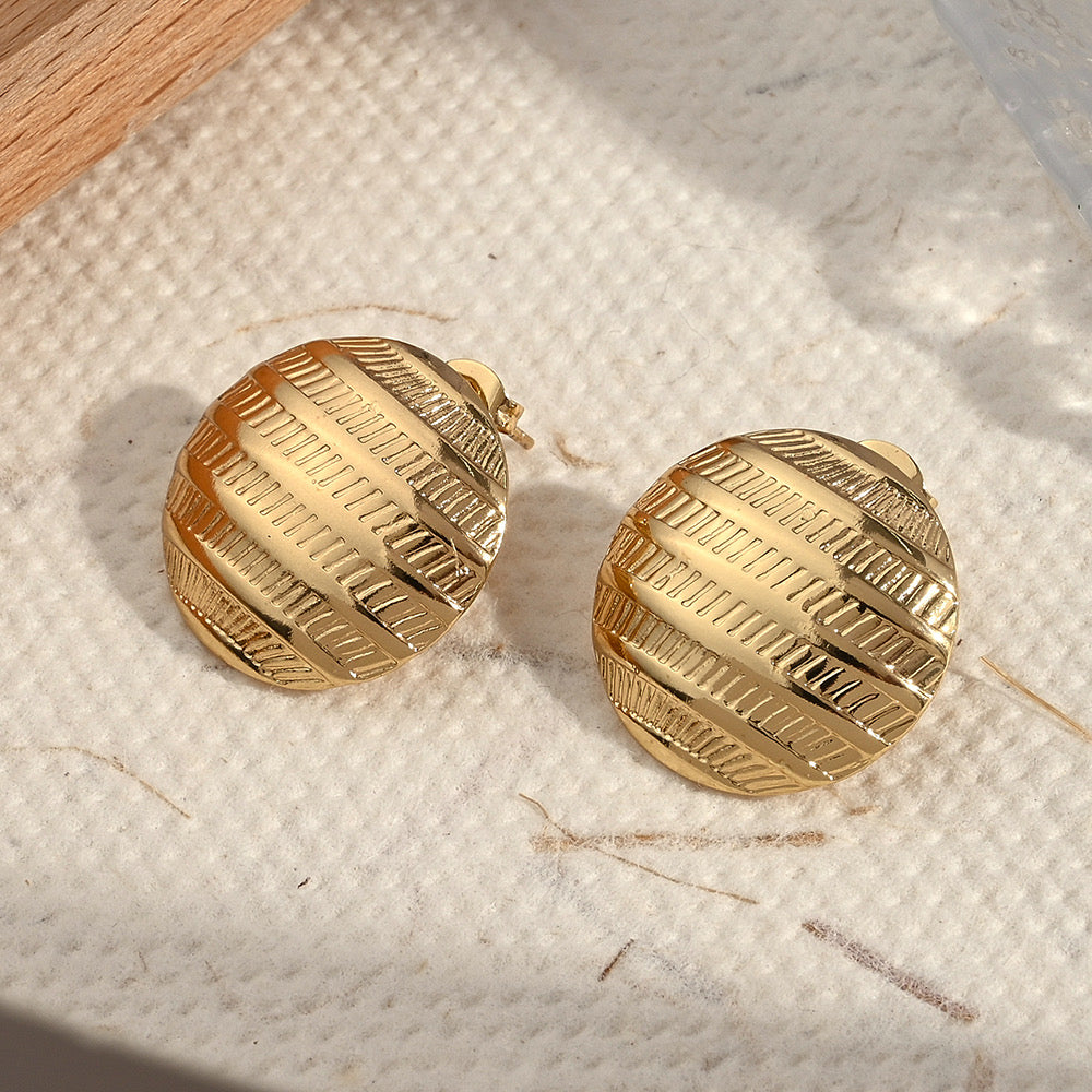 Aretes botones textura