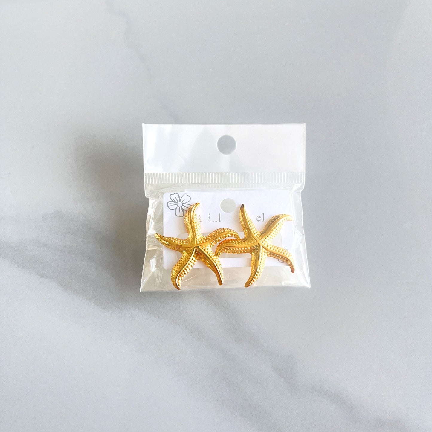 Aretes estrella de mar con textura