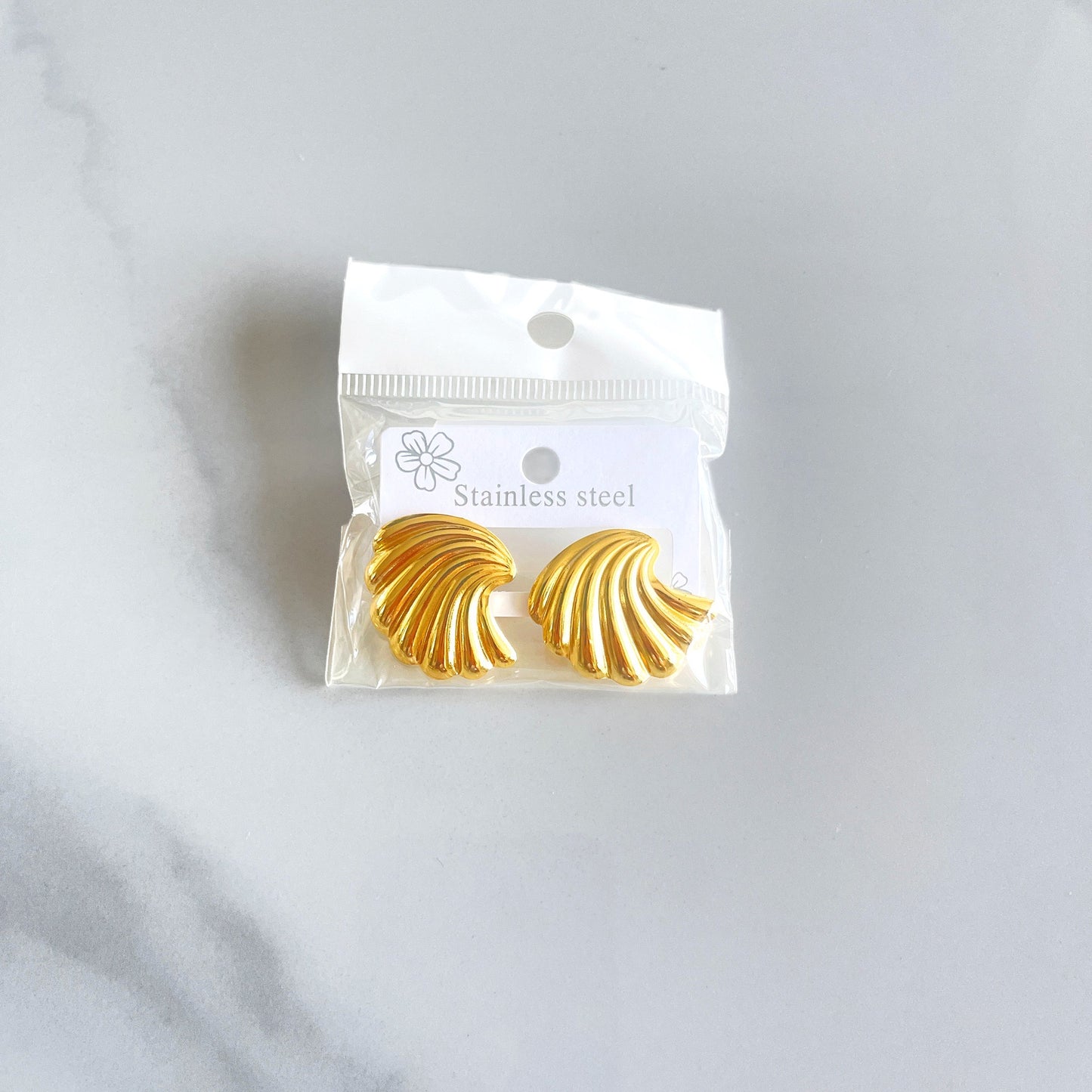 Aretes concha con ola