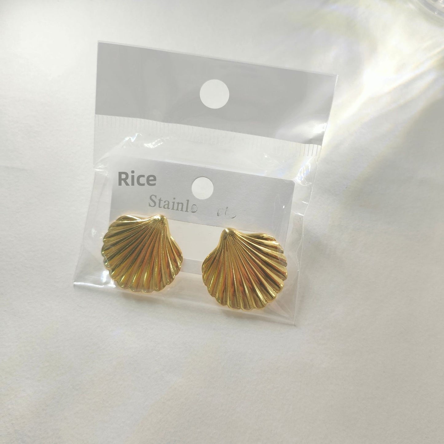 Aretes concha en pico
