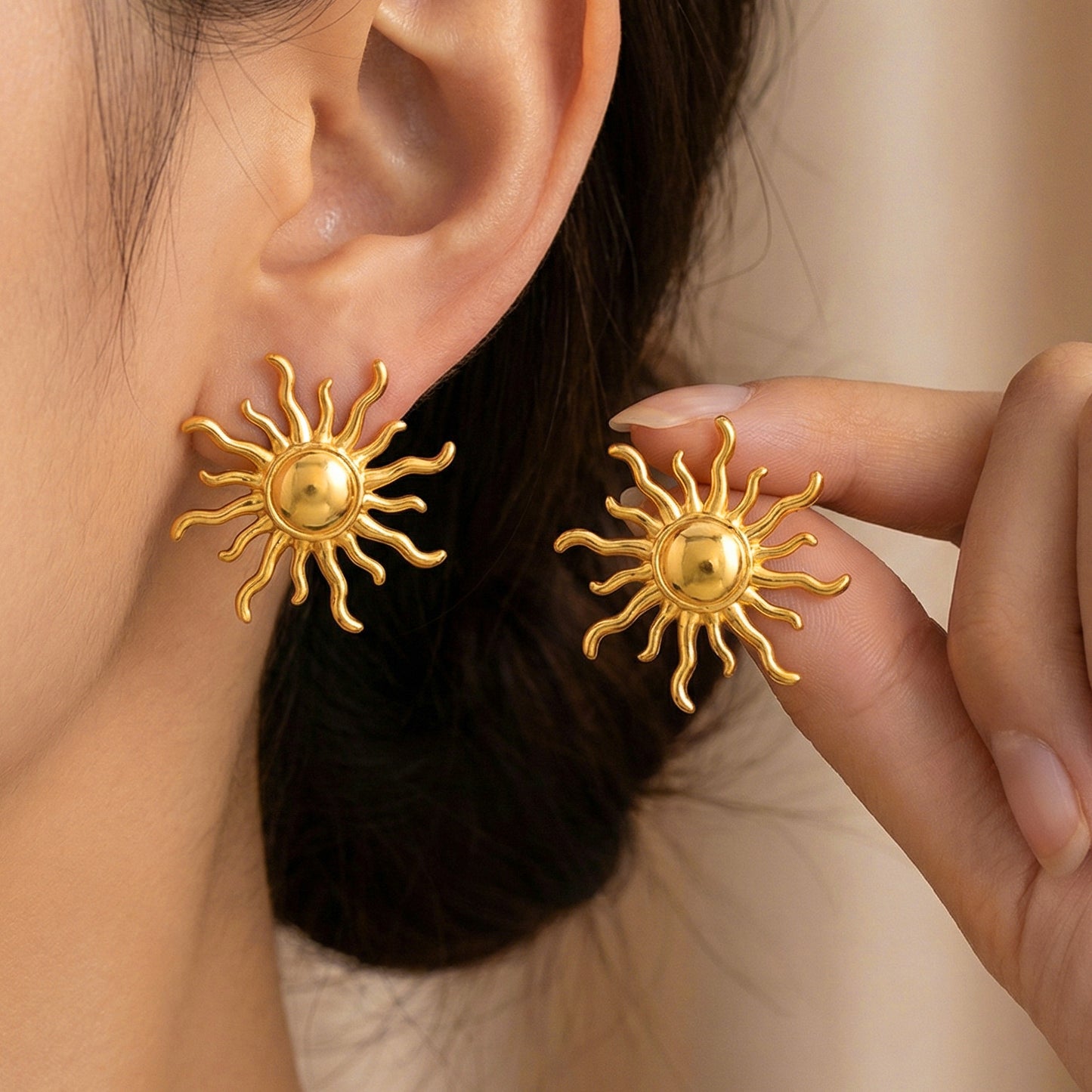 Aretes sol nuevo