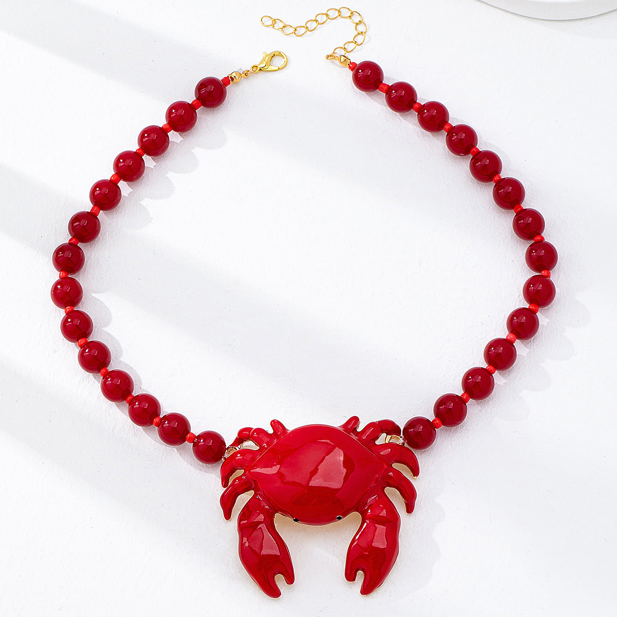 Collar cangrejo bolas rojas