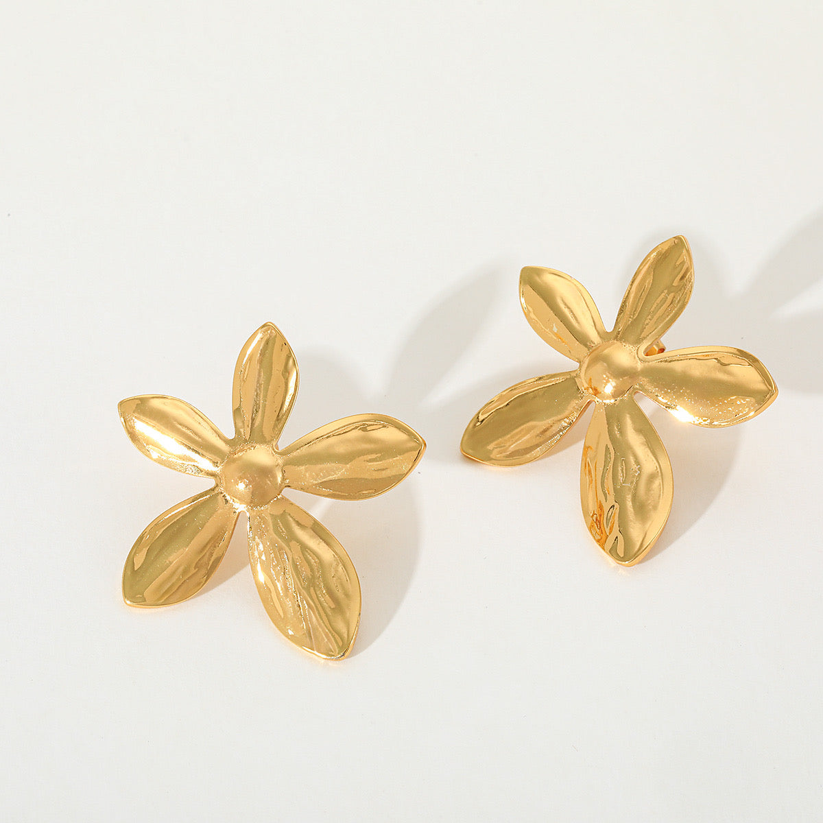 Aretes flor larguitos