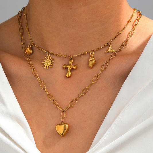 Collar doble cruz con Charms