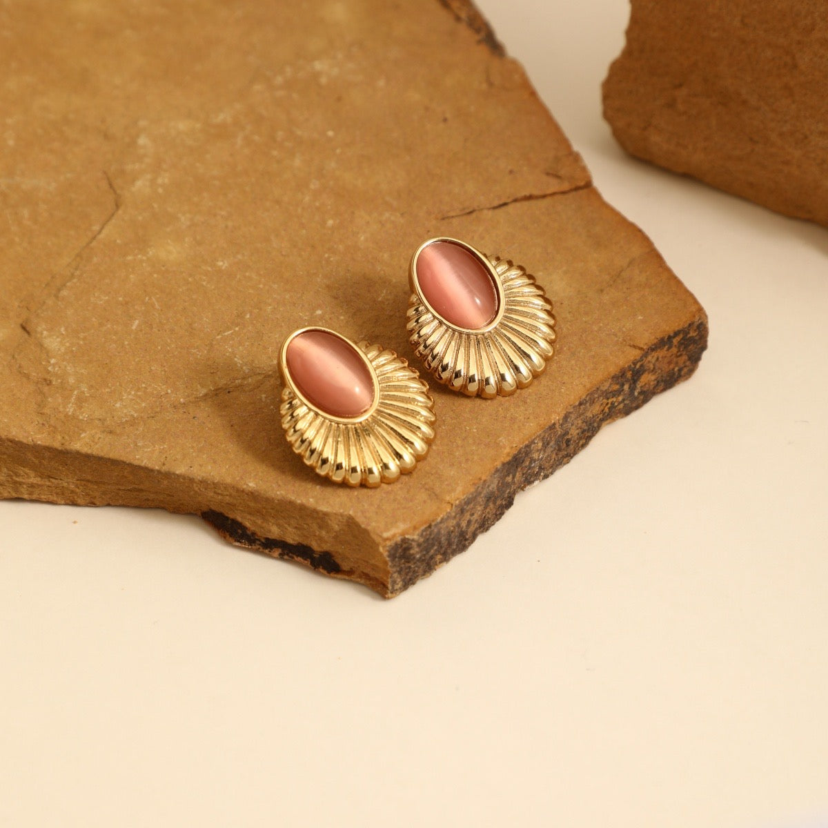 Aretes con piedrita de color