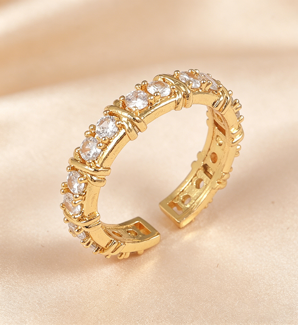 Anillo churumbela dorado con x