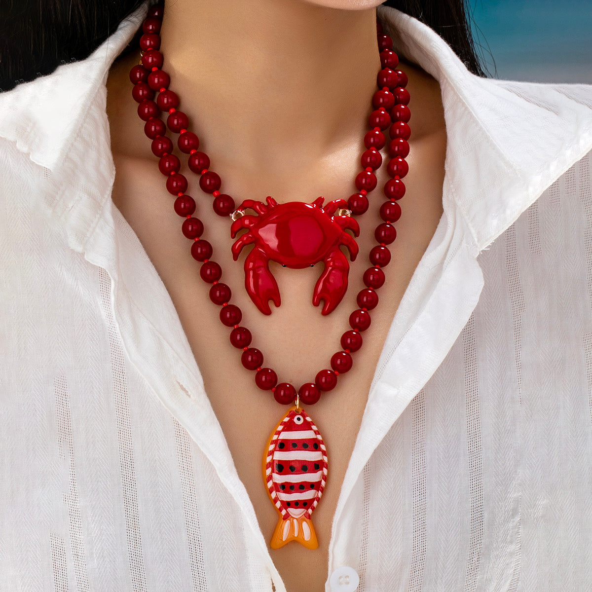 Collar cangrejo bolas rojas