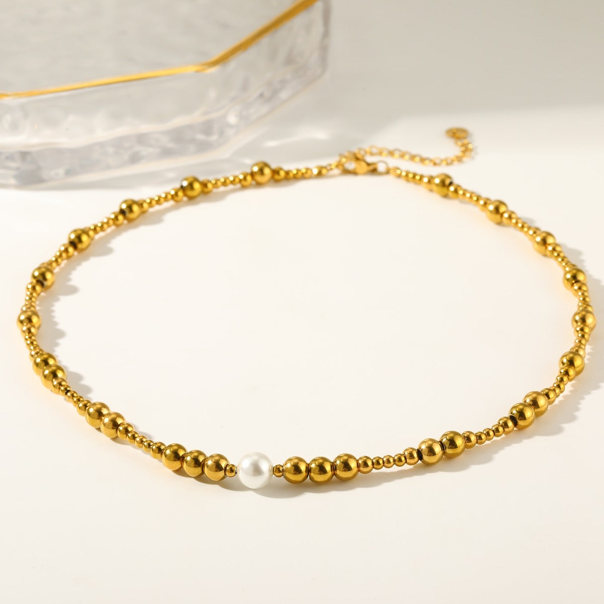 Collar balines con perla al centro