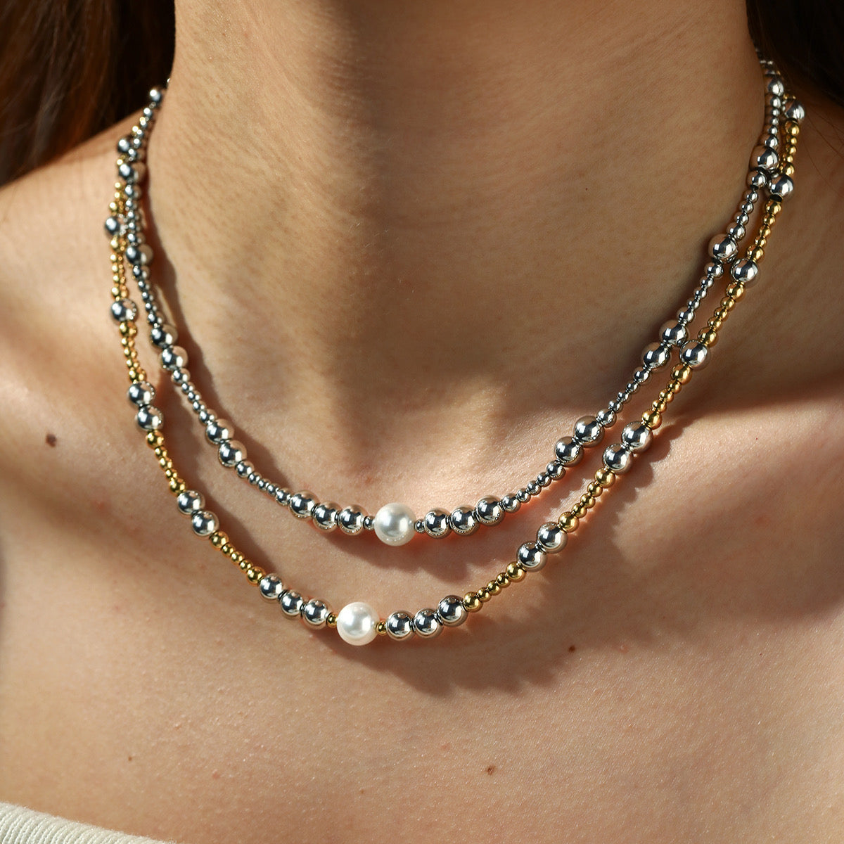Collar balines con perla al centro
