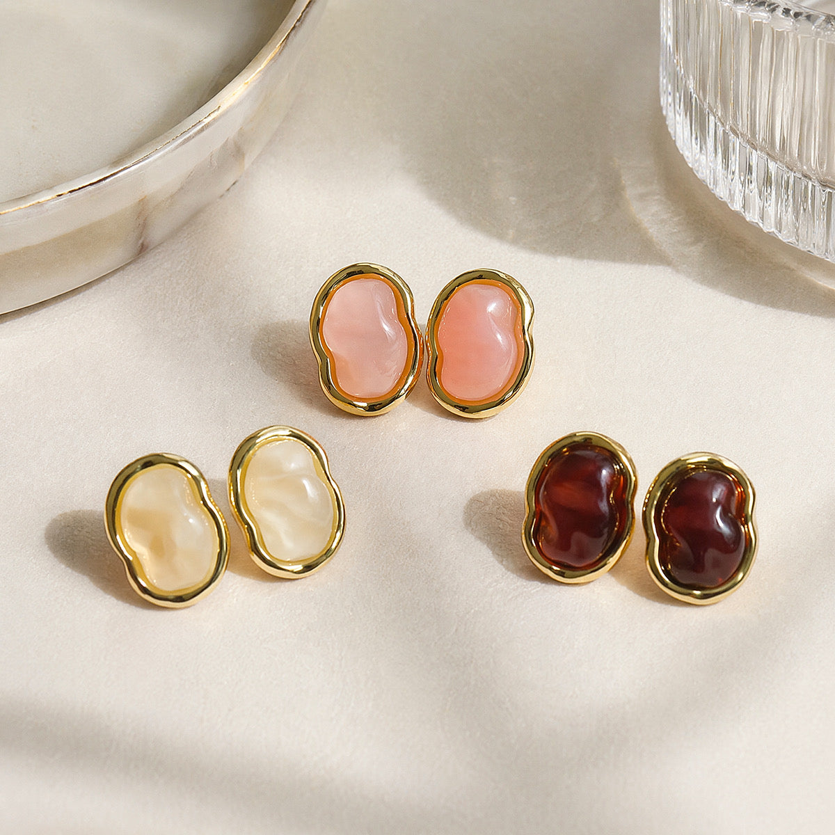 Aretes de acero con detalles en acrílico
