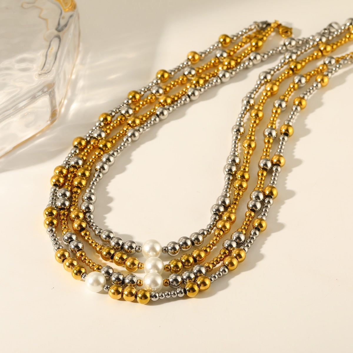 Collar balines con perla al centro