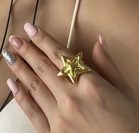Anillo estrella dorada