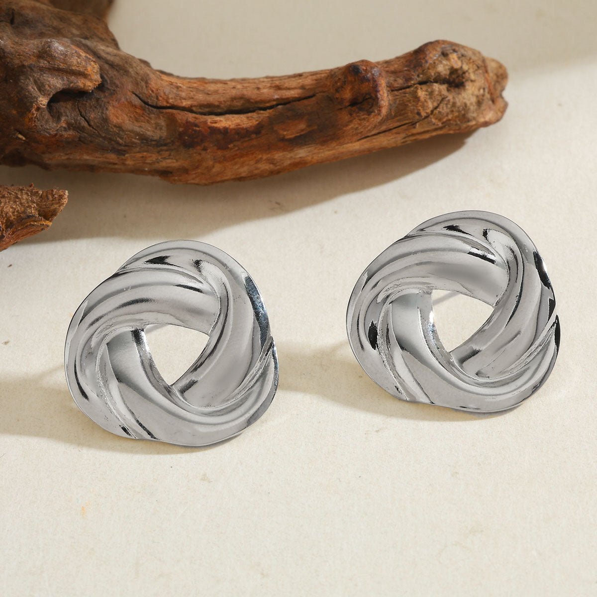 Aretes donita trenzada plata