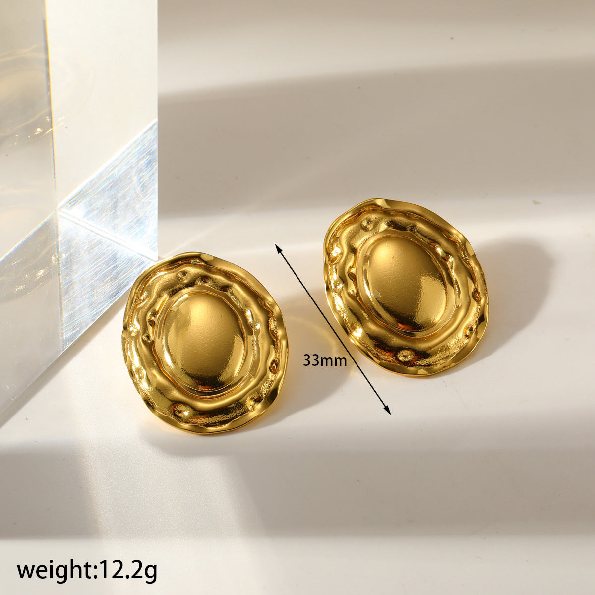 Aretes oval con diseño
