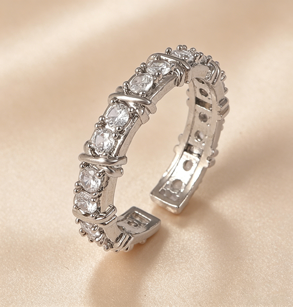 Anillo churumbela plata con X