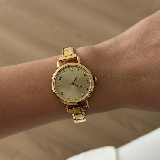 Reloj italiano reodndo carátula dorada