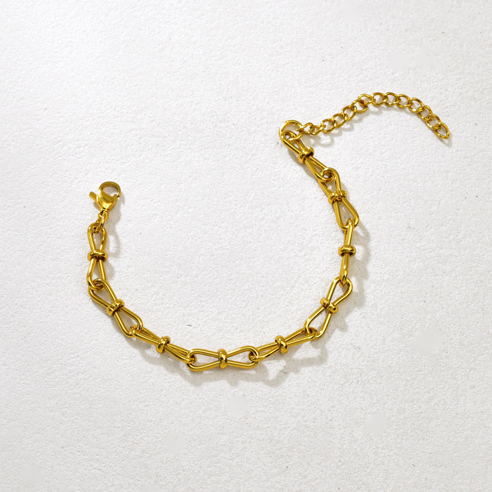 Pulsera tipo moñito unido