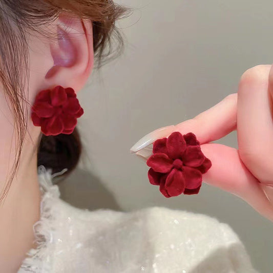 Aretes florecita tinta linda