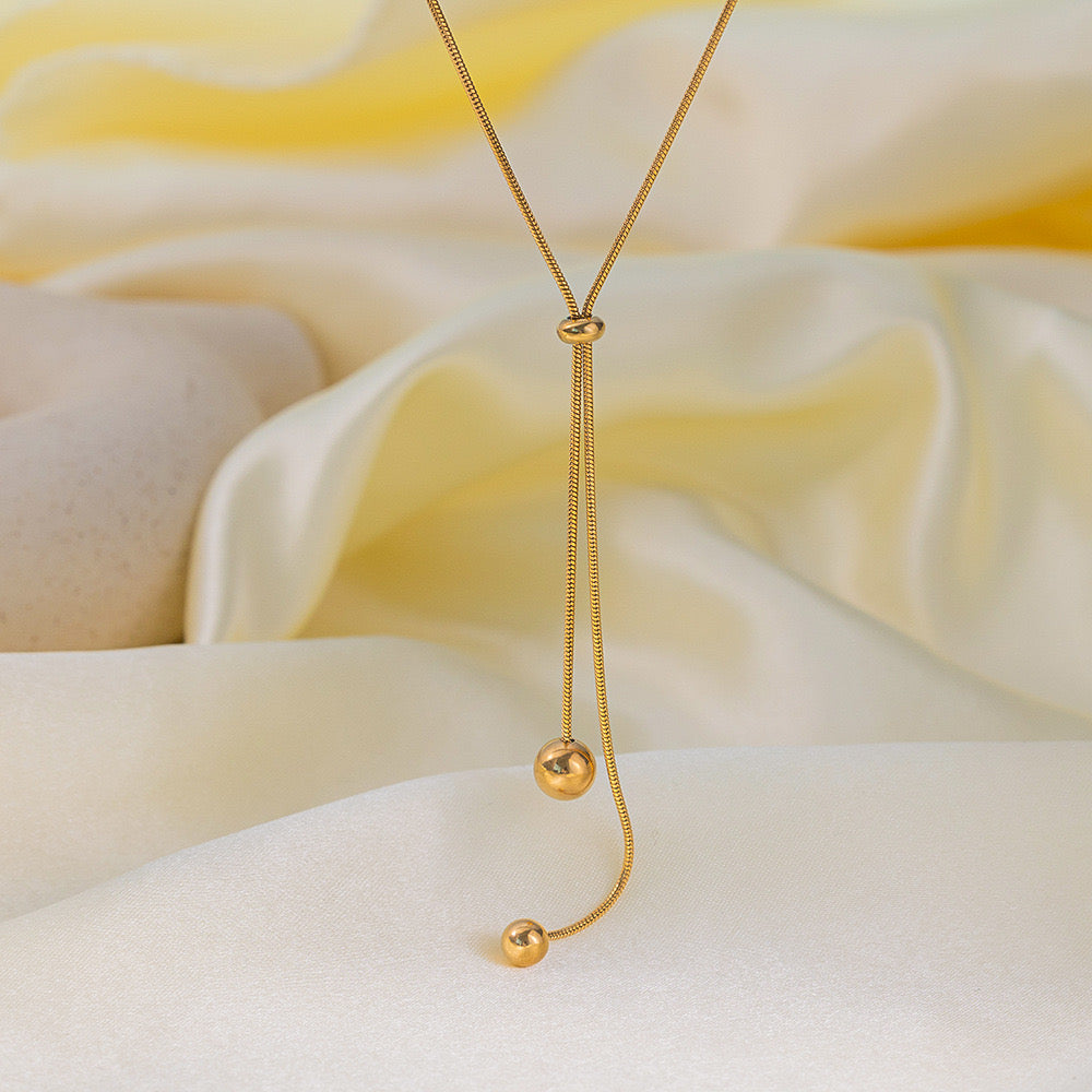 Collar corbatero ajustable con esferas irregular