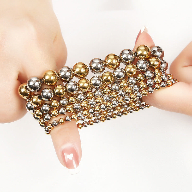 Pulsera elástica balin bitono