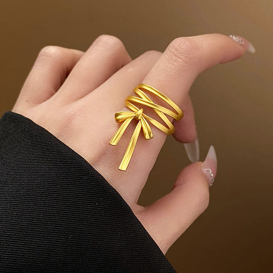 Anillo moñito dorado