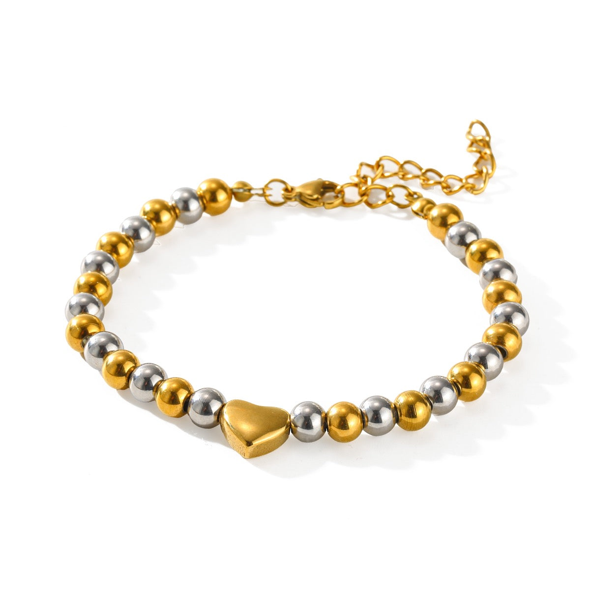 Pulseras varias en bitono y dorada