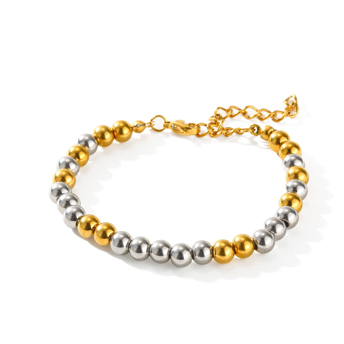 Pulseras varias en bitono y dorada