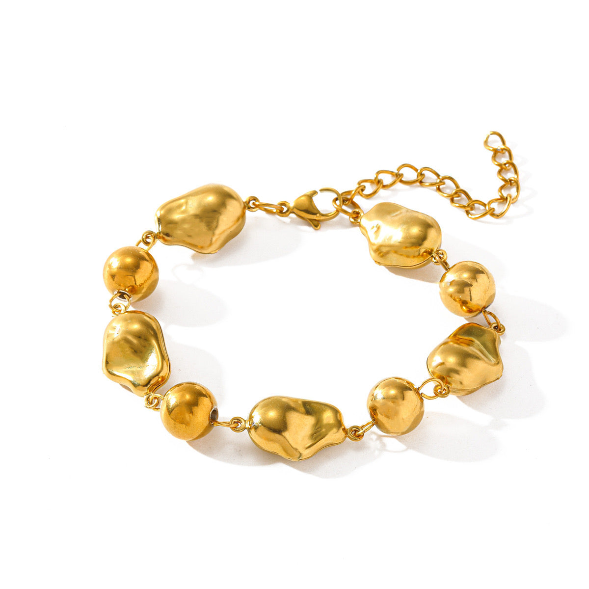 Pulseras varias en bitono y dorada