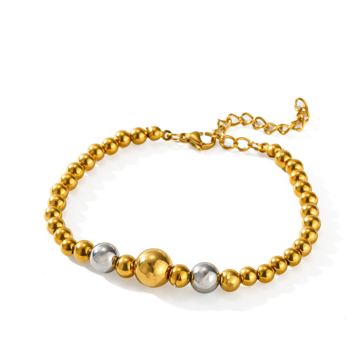 Pulseras varias en bitono y dorada