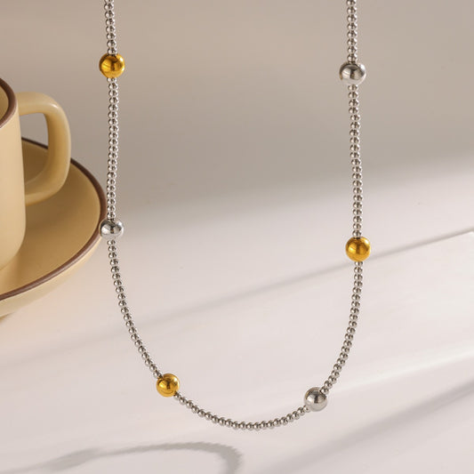 Collar de cuencas bitono salteado