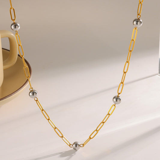 Collar bitono eslabon dorado