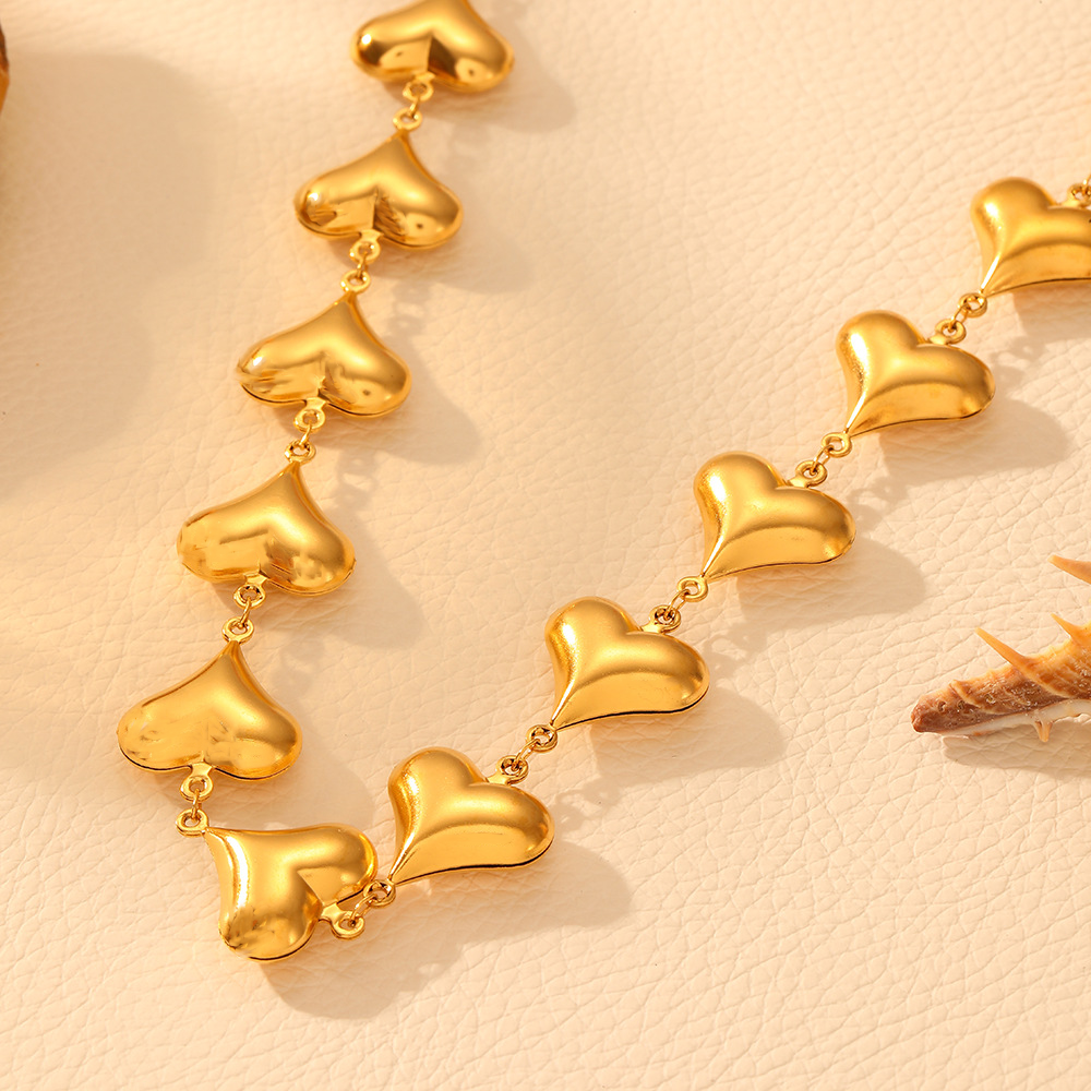 Collar corazones tupido