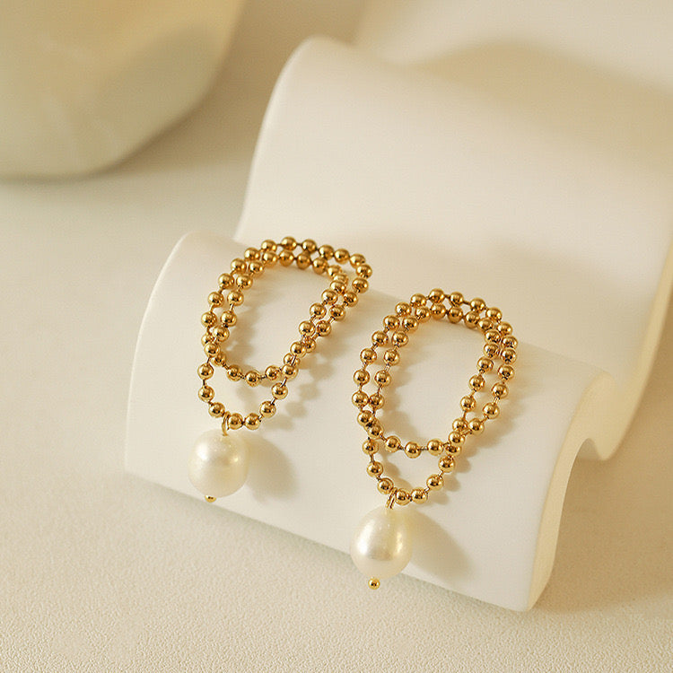 Aretes colgantes balín con perla