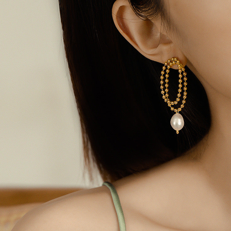 Aretes colgantes balín con perla