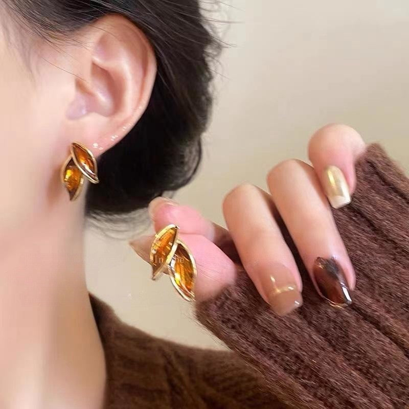 Aretes hojitas café