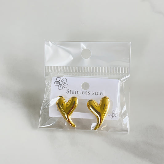 Aretes corazón con colita