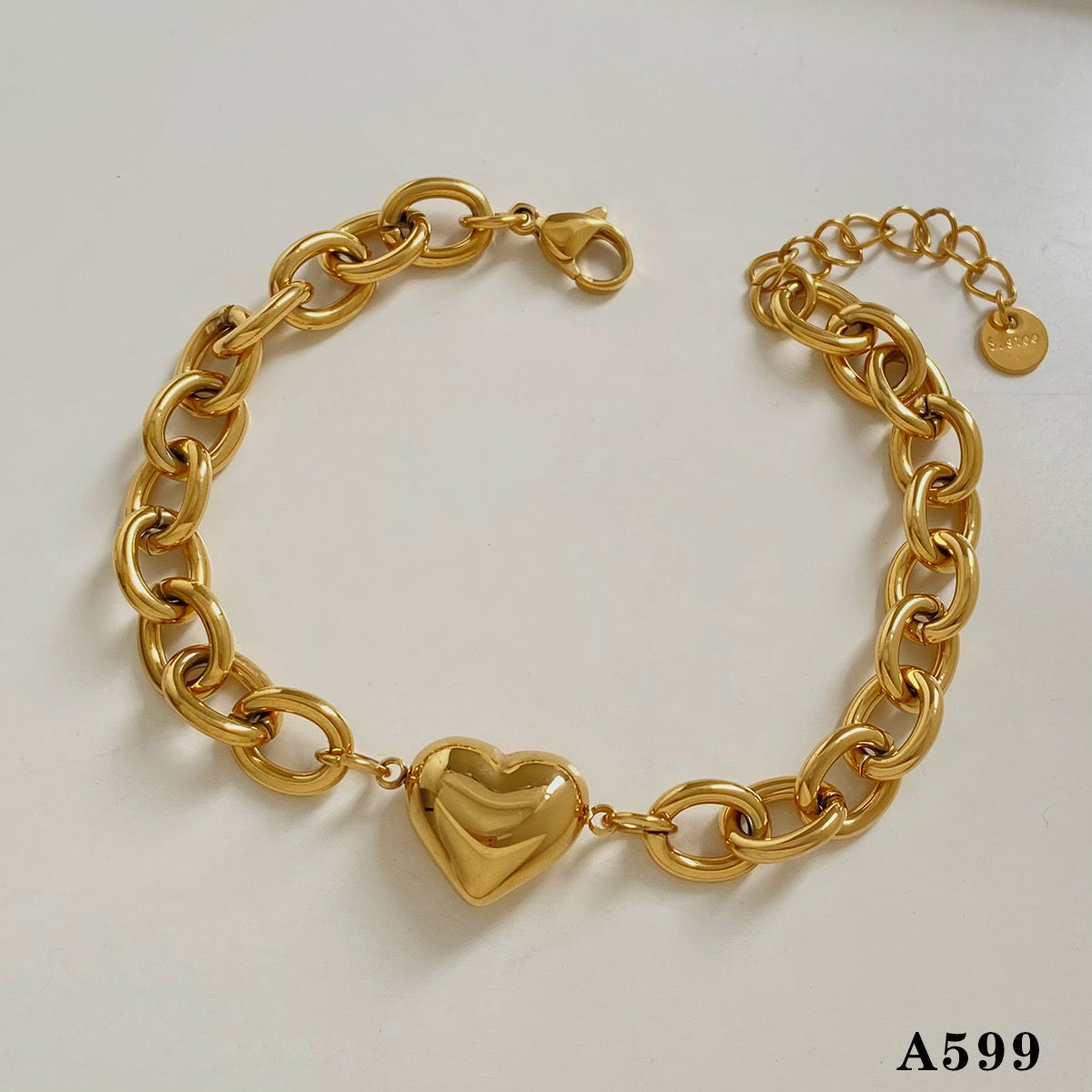 Pulsera eslabón con corazon dorada