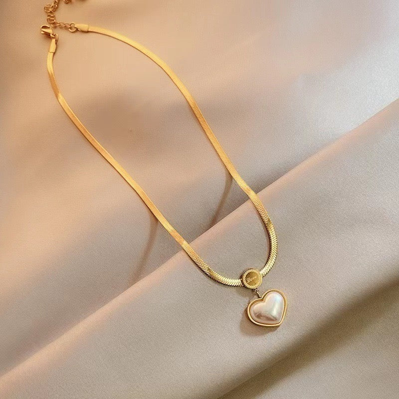 Collar planchado corazón perla