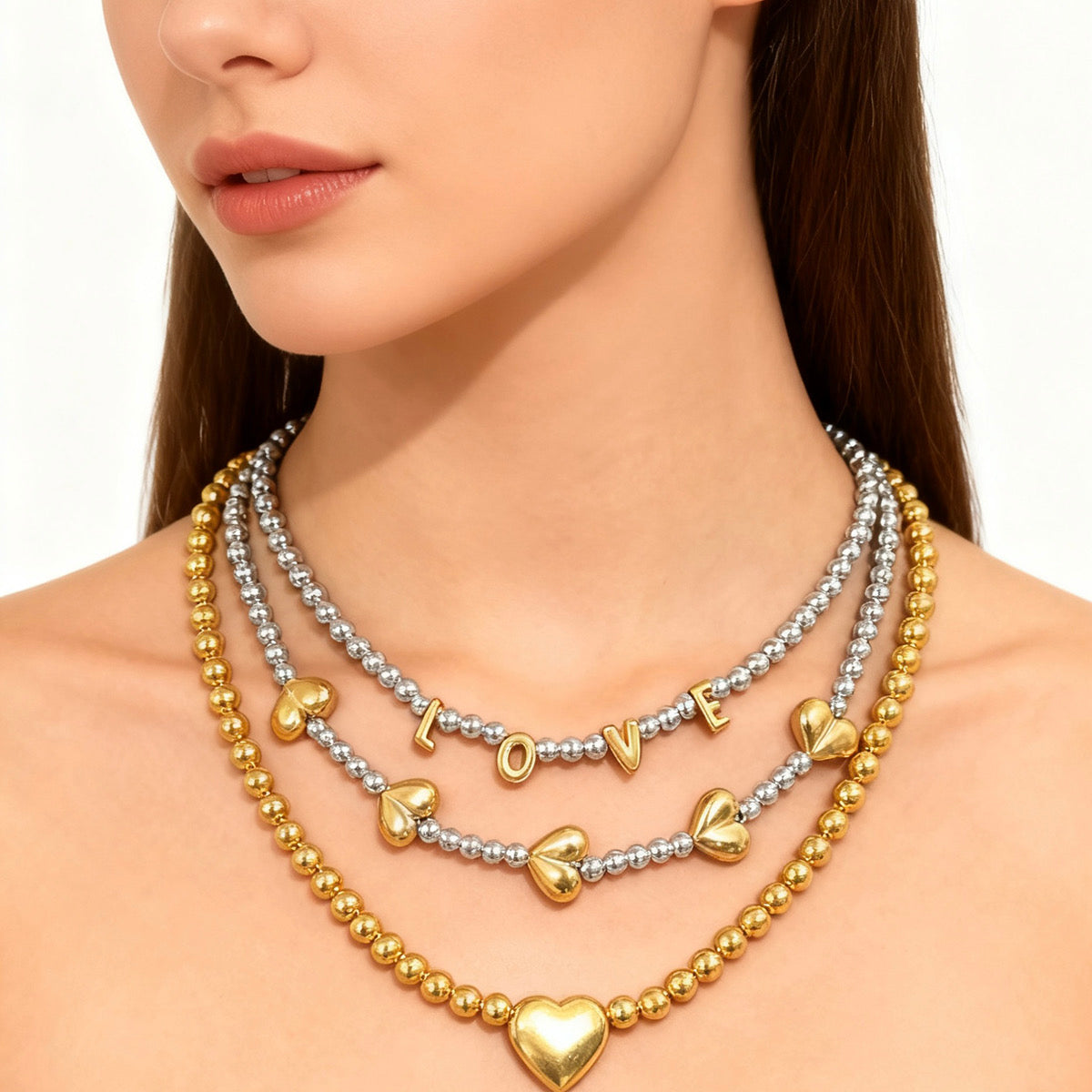 Collar balines bitono con corazón