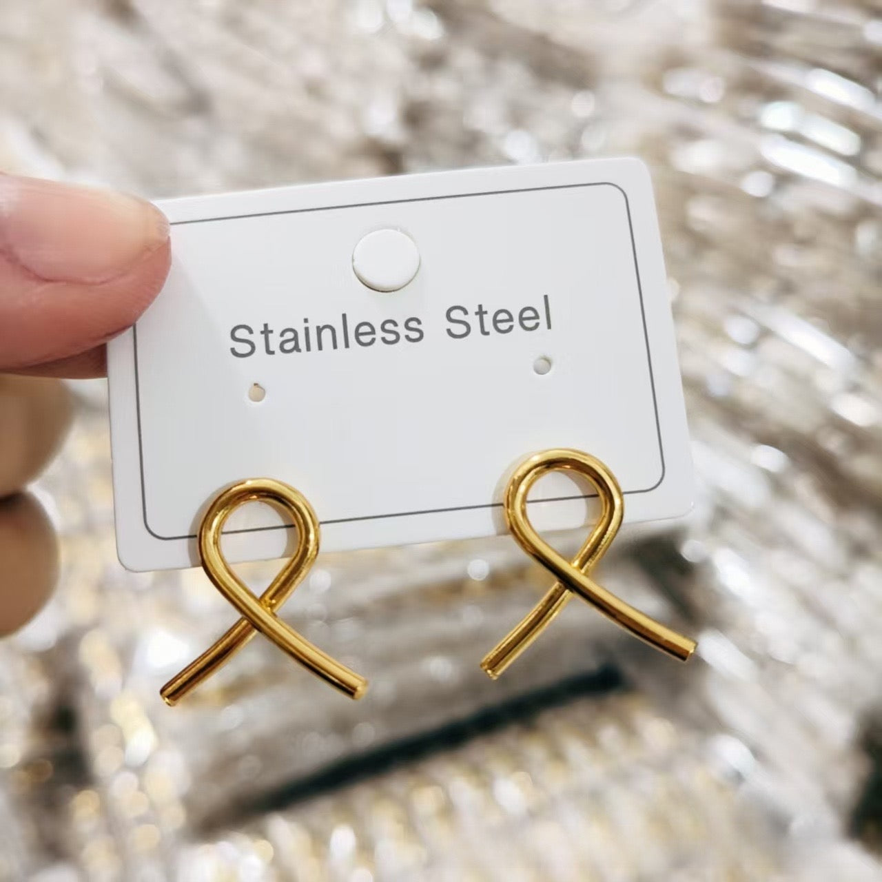 Aretes lazo mujer