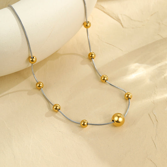 Collar bitono esfera grande al centro
