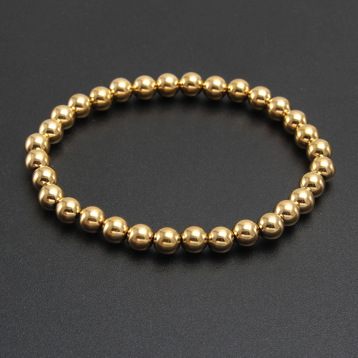 Pulsera balin dorada 6mm