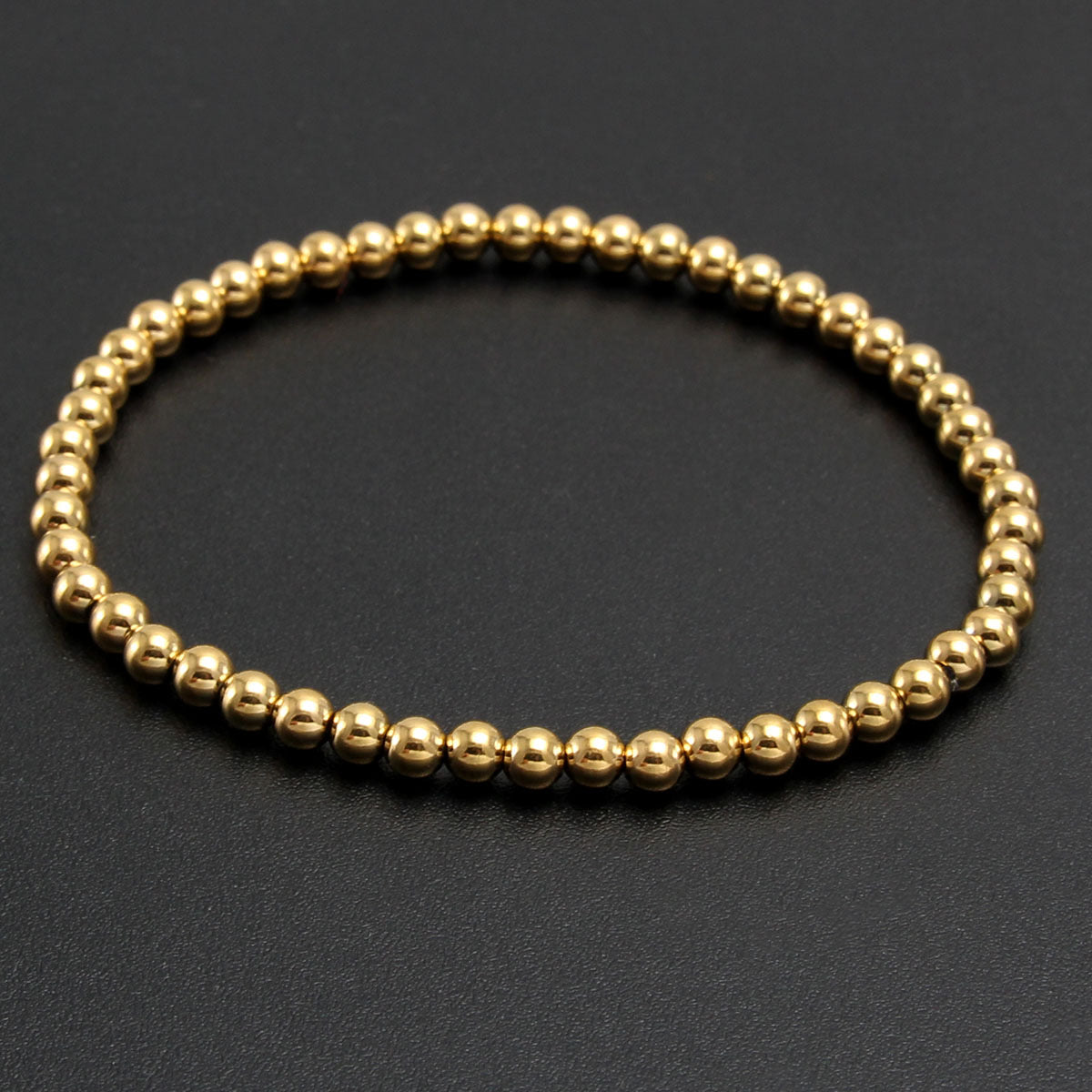 Pulsera balin dorada 6mm