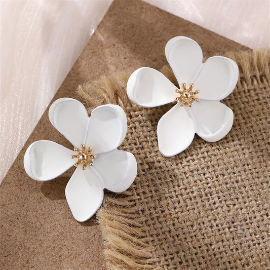 Arete flor blanquita